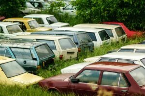 A collection of abandoned vintage cars parked in rural Tavas, Denizli, Türkiye.